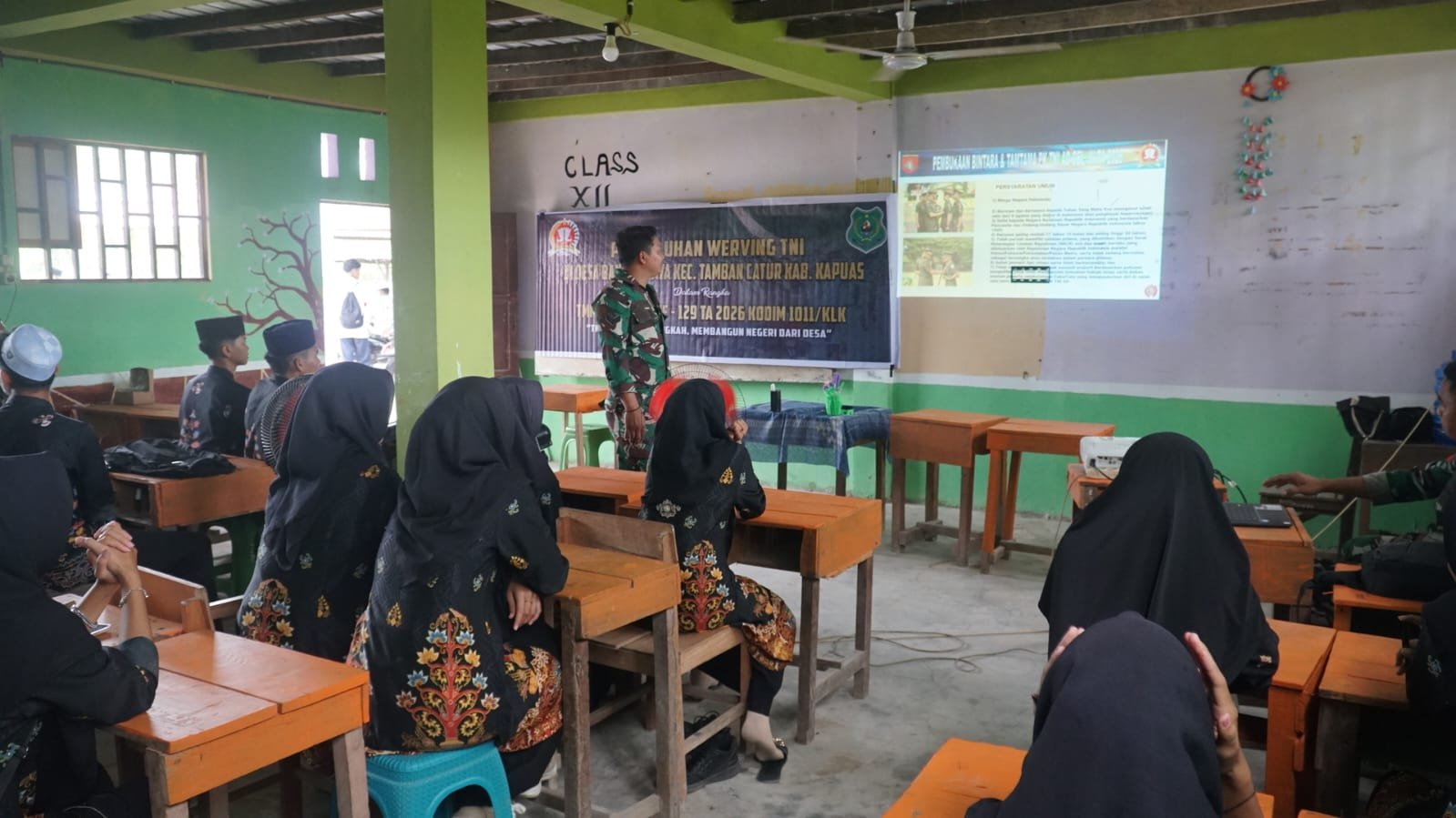 Penguatan Kesadaran Kebangsaan Melalui Penyuluhan Werving TNI di Desa Bandar Raya
